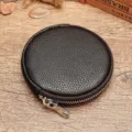 Ronde echt lederen muntbeurs met ritssluiting, compacte donkerbruine portemonnee voor tas. - koffiekleur