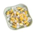 Nordic style green plastic snack tray with yellow wrapped candies for home dining table use. - 1182: 16*16*2 cm / Light Green