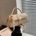 Stijlvolle creme witte PU lederen schoudertas voor dames, trendy en chique handtas. - Broken Wit