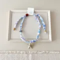 Bloemige stoffen sjaal ketting met zeester hanger, elegant zomerse strand sieraden accessoire. - 01 Zeester - blauw-roze bloemen