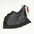 Detailed view of black and white geometric silk scarf, elegant draped square design. - 90x90cm / 09