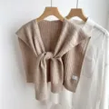 Detail shot of a cozy beige knit fake collar shawl, showing the delicate textured knit weave. - Long Chain Style / Light Coffee