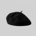 Boina de lana de color sólido clásica para mujer, sombrero de pintor de invierno vintage y elegante. - Talla única / Negro