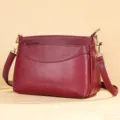 Wine red leather shoulder bag for women, stylish minimalist crossbody bag with gold hardware. - Red