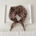 Detail view of the elegant brown paisley cotton linen square scarf, perfect for stylish neck wear. - White Flower Paisley Brown