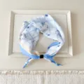 Detail view of a cute hedgehog plaid cotton linen scarf, showing exquisite prints and fine fabric. - Hedgehog Blue