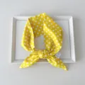 Yellow polka dot cotton ribbon scarf detail view, elegant hair band and wrist accessory for women. - 01 Pointed - Polka Dot Light Yellow