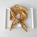 Detailed view of yellow blue polka dot cotton ribbon scarf, elegant necktie and stylish hair accessory. - 03 Pointed - Polka Dot Dark Yellow
