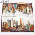 Silk square scarf featuring a chic city skyline collage print and elegant contrast border. - City