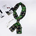 Chic green and black skinny silk scarf with golden chain print, perfect for neck or bag. - Double Ring Green
