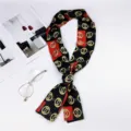 Chic long skinny silk scarf for women featuring a luxury gold chain print on black and red fabric. - Double Ring Red