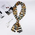 Elegant black and white striped skinny silk scarf with luxury gold chain baroque print. - Rudder Chain Beige