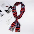Red and black stripe skinny silk scarf with classic chain and Greek key pattern for women. - Rudder Chain Red