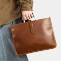 Men's brown genuine leather vintage briefcase, durable business handbag with metal handle. - Model M851 / S / Coffee