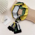 Foulard en soie étroit et géométrique chic pour femme, twilly long tendance pour le printemps. - 23 Madame Cheval Jaune Vert