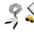 Minimalist black and white striped long scarf with beaded ring detail for chic neck styling. - Striped White