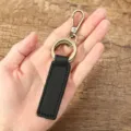 Vintage genuine leather keychain with bronze metal hook and key ring for car keys and daily use. - Black