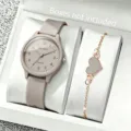 Nahaufnahme der Silikonuhr und des Armbandsets mit Herzanhänger in Roségold-Optik - Grau Set