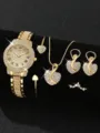 Detailansicht eines luxuriösen Damen-Uhrensets in Goldoptik mit Kristallen und Herzmotiven - Voll Strass Römische Zifferblatt Gold Set
