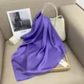 Solid color purple silk square scarf detail, elegant glossy fabric design for women style. - Purple