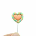 Miniature handmade heart-shaped lollipop polymer clay charm for DIY craft projects - Approx 2x2cm / Light Orange