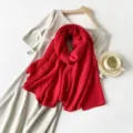 Elegant solid red pleated scarf for women, lightweight shawl draped on a dress. - Red