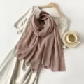 Elegant dusty pink pleated imitation cotton linen scarf for women in a soft crinkle texture - Camel