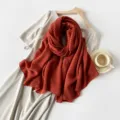 Elegant pleated scarf in burnt orange, solid color imitation silk headwrap for women. - Almond