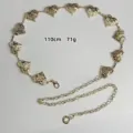 Gold heart chain belt detail showing metal links and adjustable length for dresses. - Heart Waist Chain / Gold