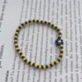 Braccialetto di perline giallo e nero in stile coreano carino con ciondolo a margherita. - Giallo-Nero