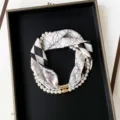 Detailed view of pearl silk scarf necklace with magnetic clasp, black and white printed design. - PC3682-Diamond Lines