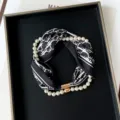 Exquisite black and white printed silk scarf paired with pearl magnetic necklace detail. - PC3682-Letter D
