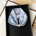 Chic blue floral silk scarf featuring a large pearl magnetic buckle, elegant neck accessory detail. - PC3683-Blue Lotus