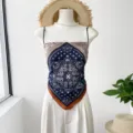 Stylish paisley print crop top featuring delicate spaghetti straps for summer wear. - Vintage Paisley