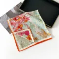 Luxurioser Seide-Wolle Quadrat-Schal mit lebhaftem Dschungel-Blumenprint und orangen Rollkanten. - SM6501-Naturorange