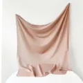 Close-up detail of solid color Turkish yarn square scarf, soft nude pink texture drape. - Flax