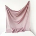 Detail view of the solid color Turkish yarn square scarf, showing soft texture and drape. - Mauve