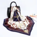 Detailed view of 90cm square satin silk scarf featuring elegant equestrian chain and belt print design. - D9035-Blue