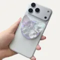 Close-up view of a laser holographic butterfly phone socket stand on a silver magnetic case - Magnetic Stand / Purple