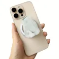 Detailed view of translucent faux agate magnetic phone grip on smartphone - Magnetic Stand / Pale Green Agate Texture