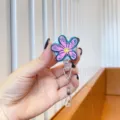 Close-up of cute pink doodle flower retractable badge reel with durable alligator clip - Graffiti Blue Flower