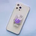 Dettaglio di un supporto per telefono a forma di orso trasparente con lecca-lecca - Supporto a gonfiabile / Orso Lecca-lecca Viola