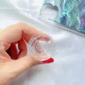 Gedetailleerd overzicht van een transparante ronde telefoonhouder voor DIY-harsknutselen - Rond Met Groef / Transparant