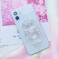 Dettaglio ravvicinato di un supporto per telefono a forma di orso 3D trasparente - Supporto a gonfiabile / Orso con Fiocco Trasparente