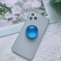 Supporto per telefono espandibile in stile sfera di cristallo blu su smartphone grigio - Supporto a gonfiabile / Sfera di Cristallo Blu
