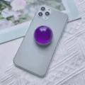 Supporto per telefono espandibile a sfera di cristallo viola su superficie bianca - Supporto a gonfiabile / Sfera di Cristallo Viola