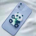 Close-up of cute panda acrylic phone grip with bamboo design on purple phone - Expanding Stand / Panda with Bamboo