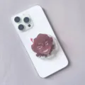 Detailed view of an acrylic anime character phone socket grip on a white smartphone - Expandable Stand Style 1