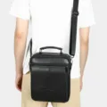 Black genuine leather vertical men shoulder bag with zipper and adjustable strap for daily use - Black