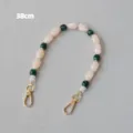 Close-up of 38cm acrylic beaded chain strap with cream and green stones and gold clasps - Beaded Style / 38cm Size / Beige Green